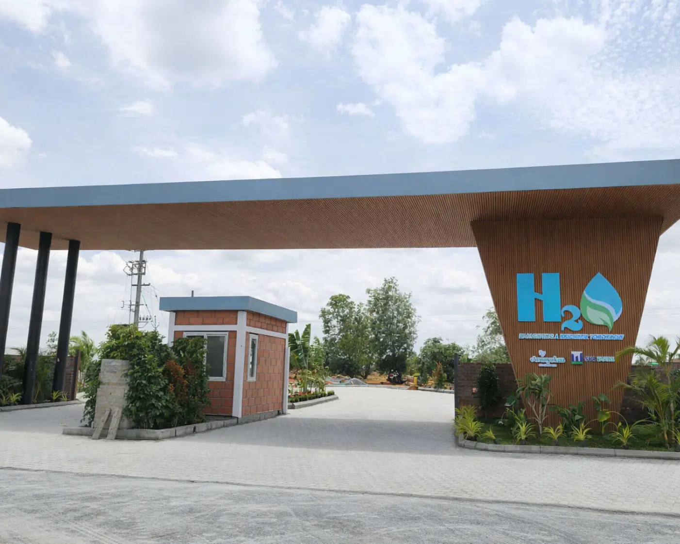 Entrance gate of h2O farms showcasing managed farmland project