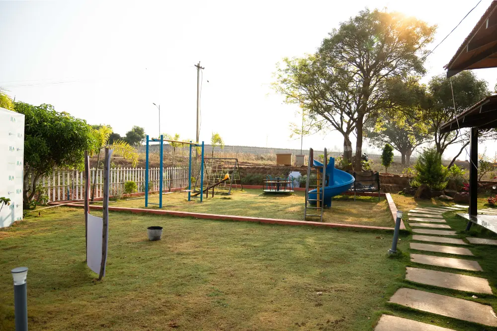 Kids play area at h20 farms with safe, open space in a green farm setting