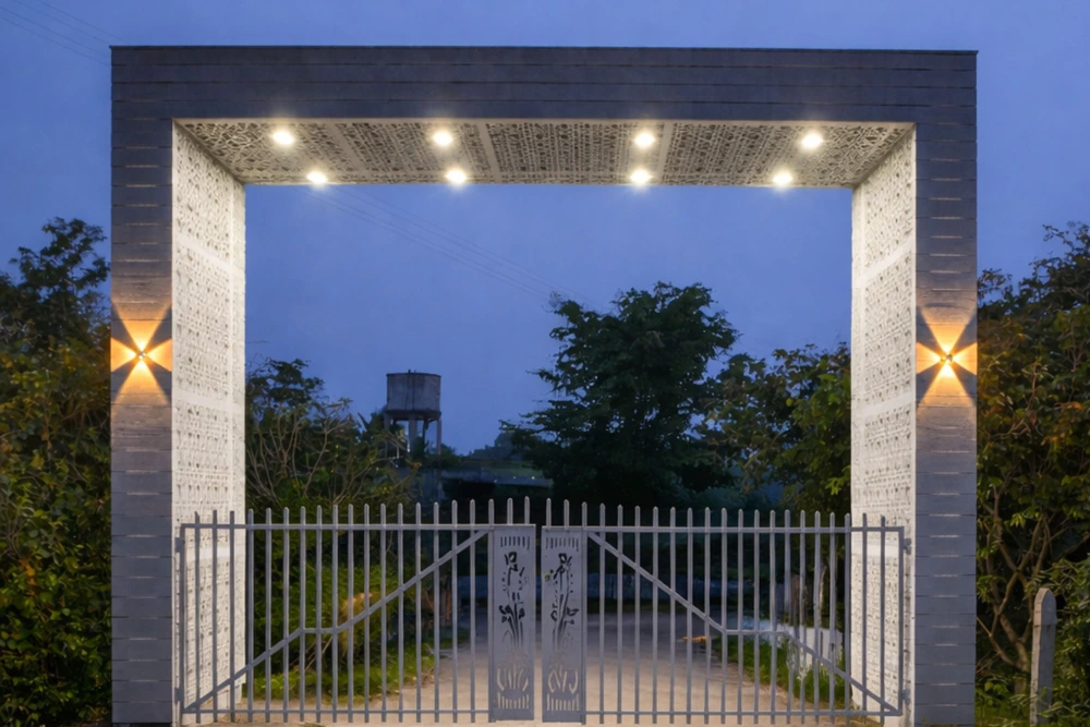 Entrance gate at lakeview project with a welcoming design and scenic farmland surroundings