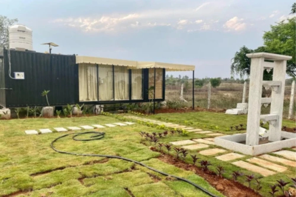 Sangam farms cottage in thally with scenic views and lush greenery.